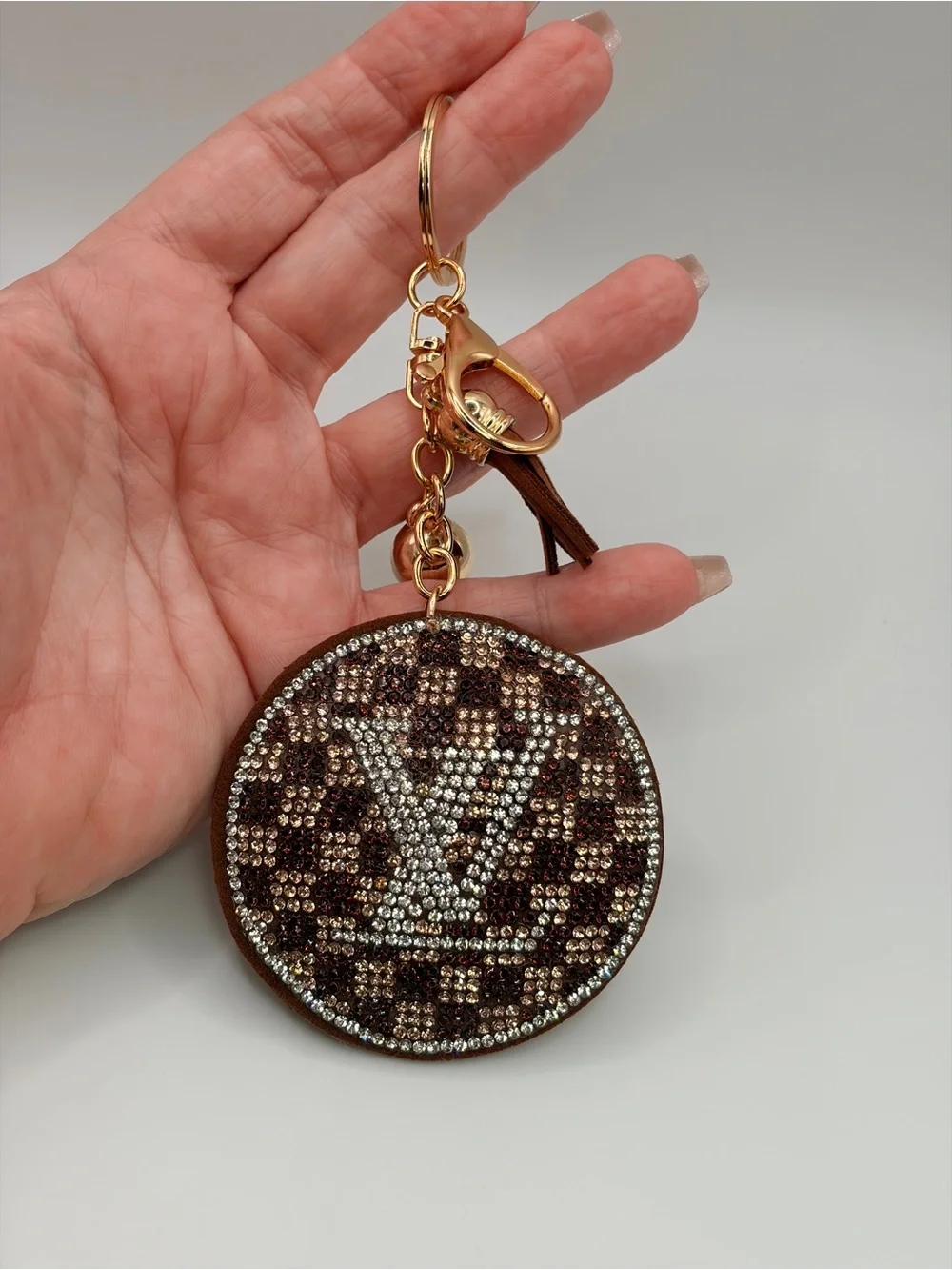 Crystal-Embellished Round Keychain Charm in Brown and Gold